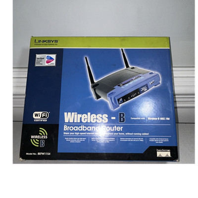 Linksys BEFW11S4 Wireless-B 802.11b Router 11 Mbps, 4-Port 100 Mbps, Wi-Fi
