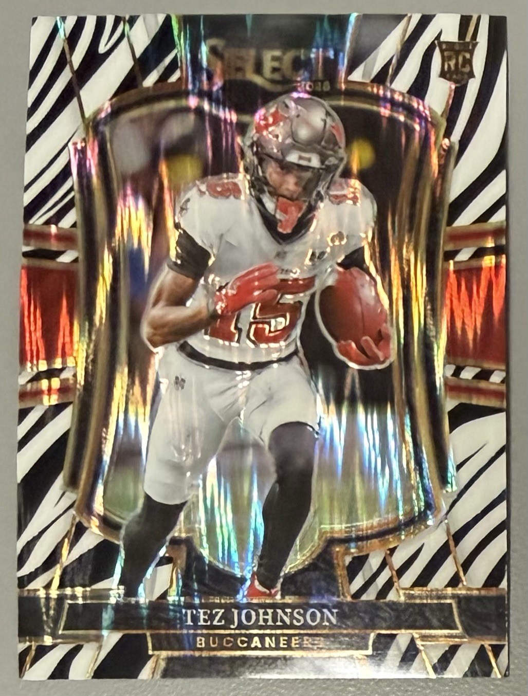 Tez Johnson 2025 Panini Select #138 Premier Level Zebra Prizm SSP RC Buccaneers