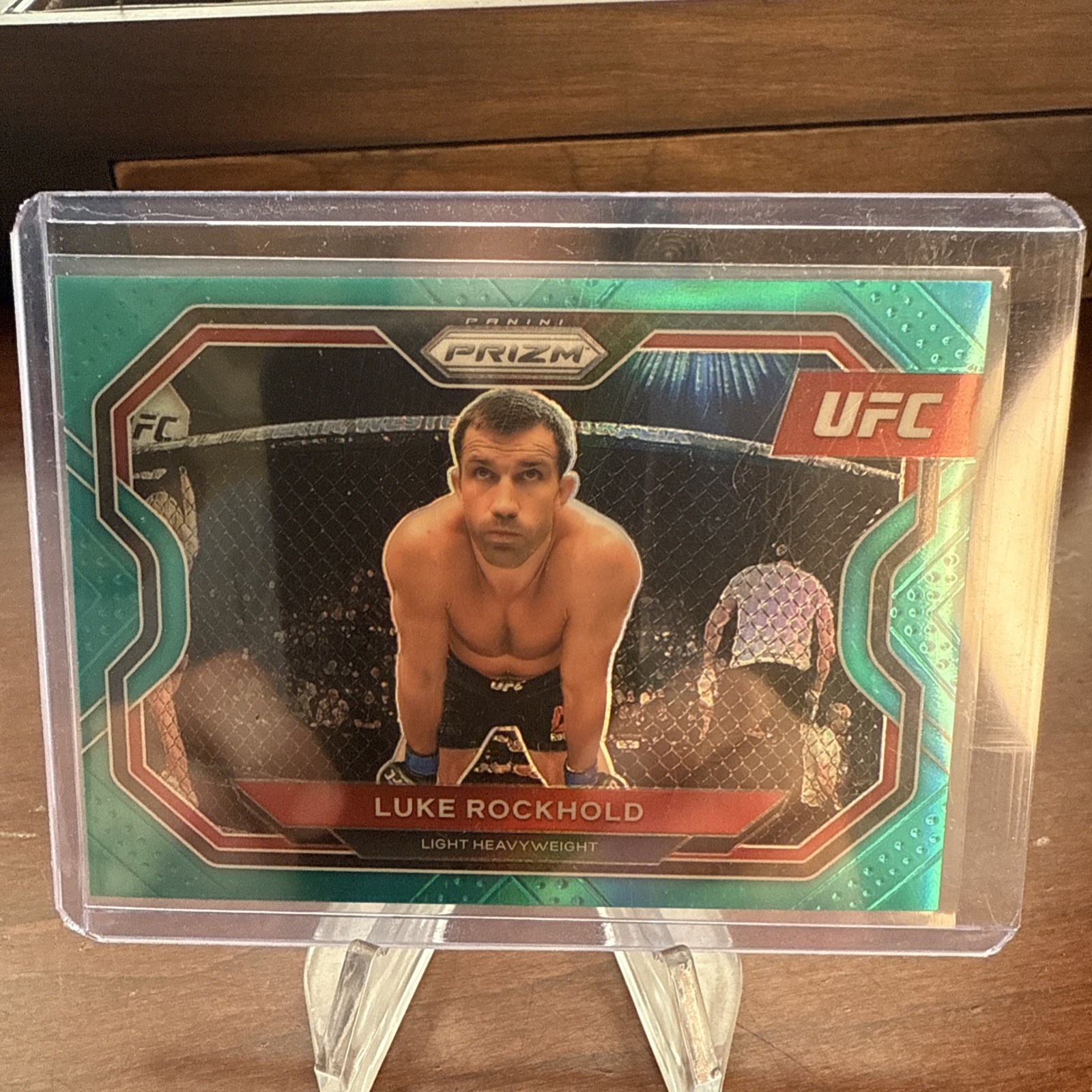 Luke Rockhold 2021 Panini Prizm UFC Teal Prizm /49