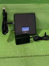 CISCO LINKSYS  CM100 100 Mbps Modem with USB and Ethernet Connections W/ Cords