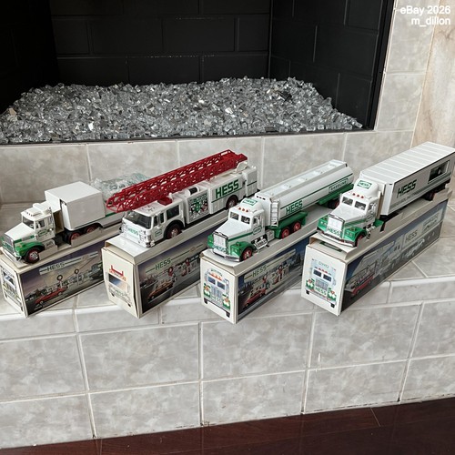 Lot of 4 Hess Toy Trucks from 1988, 1989, 1990, 1992 in Boxes w/ Inserts Lights