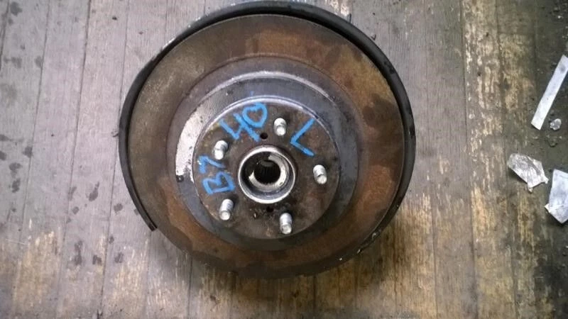 Subaru Impreza Forester 2002-2007 eje trasero izquierdo eje nudillo (frenos de disco) Foto 3 de 3