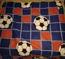 46 X 60 Fleece Throw Soccer Balls on red blue One Layer stitched edge 275578