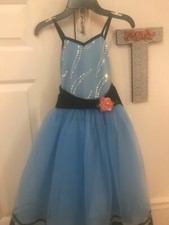 girls dance ballet dress light blue. With pink rose and black bow in back