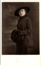 Postcard RPPC Woman Dark Hat Jacket Hand Warmer Fur Unknown D179