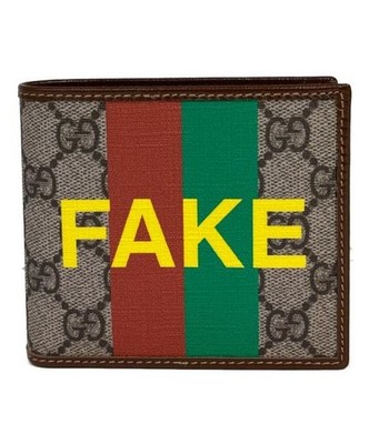 GUCCI                    Fake/Not Bi-fold Wallet brown 636167