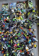 LEGO BIONICLE 4 Manuals + Lot Assorted Pieces Masks Parts Weapons Figures
