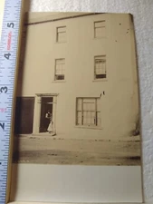 Postcard Man & A Little Girl By The Door