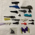 Vintage lot of 19 Transformers G1 weapons & accessories