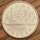 1986 Canada $1 one dollar VOYAGEUR coin **75% off combined shipping**