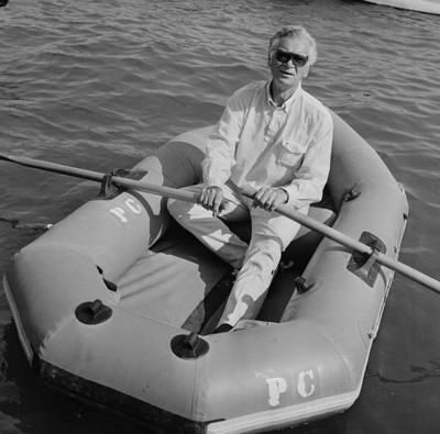 American actor dancer Buddy Ebsen rowing back to catamaran a rubbe- Old Photo