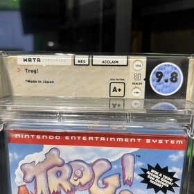 Trog! - WATA 9.8 A+ Sealed (NES 1991) Dot-Gobbling Dinos Meet NES Mayhem