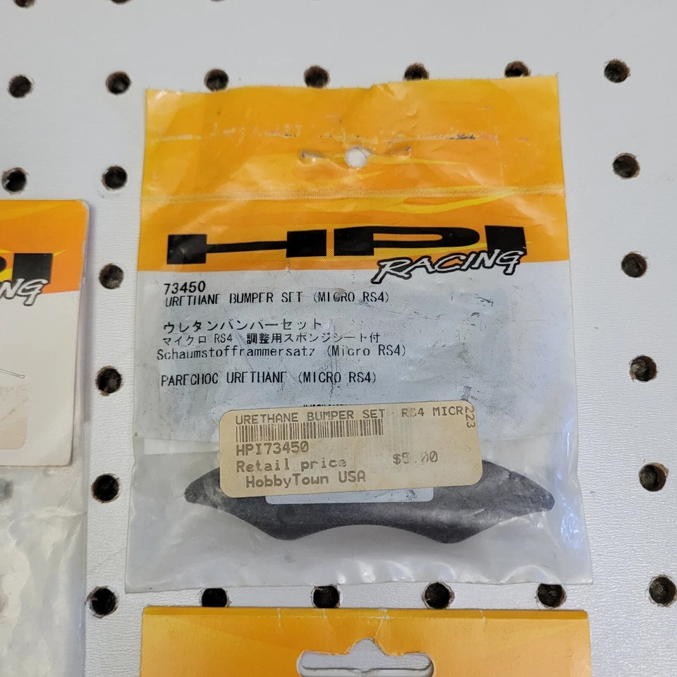 HPI Racing ~ Micro RS4 ~ 4 Item Parts Lot ~ Chassis, Belt, Bumpers, Plug NIP NOS - Image 3 of 4