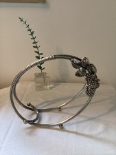 Metallflaschenhalter mit Weinblatt Dekor aus den 70er Jahren.