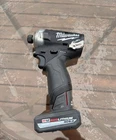 Black M12 Milwaukee FUEL 2551-20 1/4" Brushless Surge Hydraulic Impact