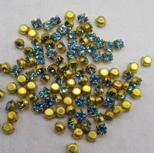 100pc Swarovski Rhinestone; Aquamarine w/ Gold Plating; 3mm, 4 Prong; SS12; pp24