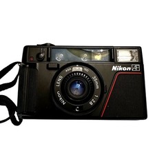 Nikon L35AF Pikaichi 35mm Point and Shoot Film Camera with Strap and Case