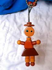 Vintage 1940's Orange Butterscotch BAKELITE Tykie Toy Bead Girl Doll Crib Toy