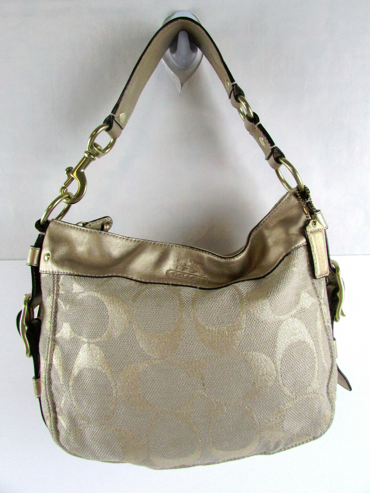 Coach monogram gold leather and canvas purse Gem