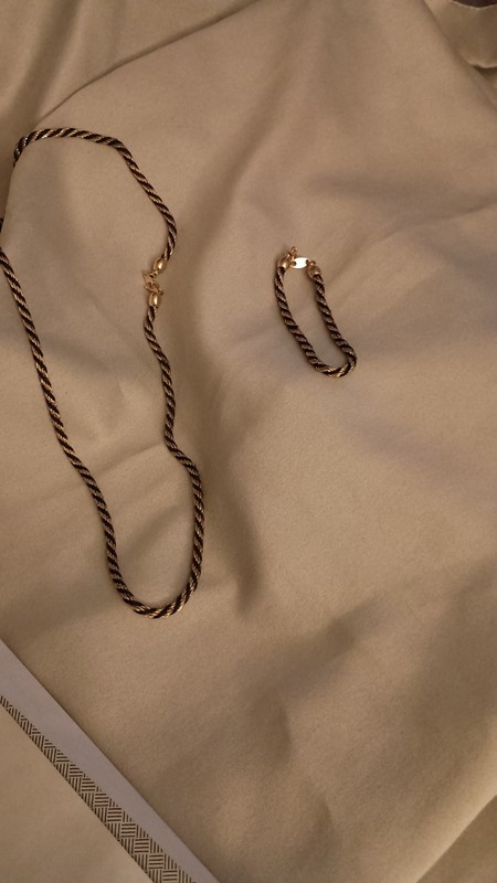 Woman's Gold And Black Necklace And Bracelet Set