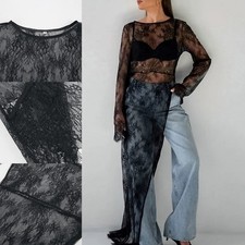 Robe femme tendance en dentelle à manches longues et ourlet irrégulier à port