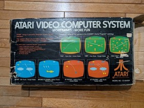 Atari CX2600A Console, two sticks, two paddles, and two games. Tested & Working!