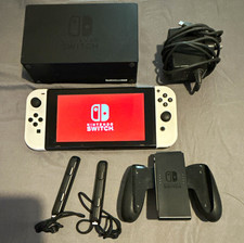 Nintendo Switch Console with Dock, Charger, comfort grip and white joycons
