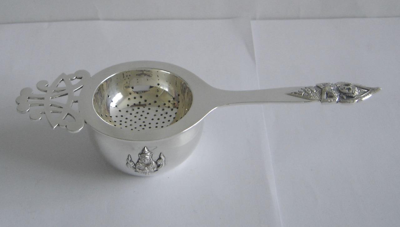 A Nicely Designed Sterling Silver Tea Strainer Complete With Drip Bowl