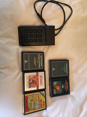 5 Atari games, football, star raiders, Baseball Canyon Bomber Big Bird and contr