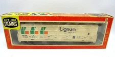 NIB - HO Scale Life-Like Lignum Forest Products 54' Thrall Door Box Car - NIB