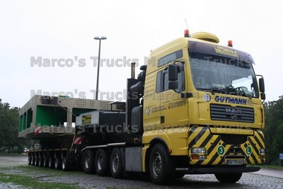 LKW Foto MAN TGA Schwerlasttransporter Deutschland gelb GUTMANN BigMove #m5pc