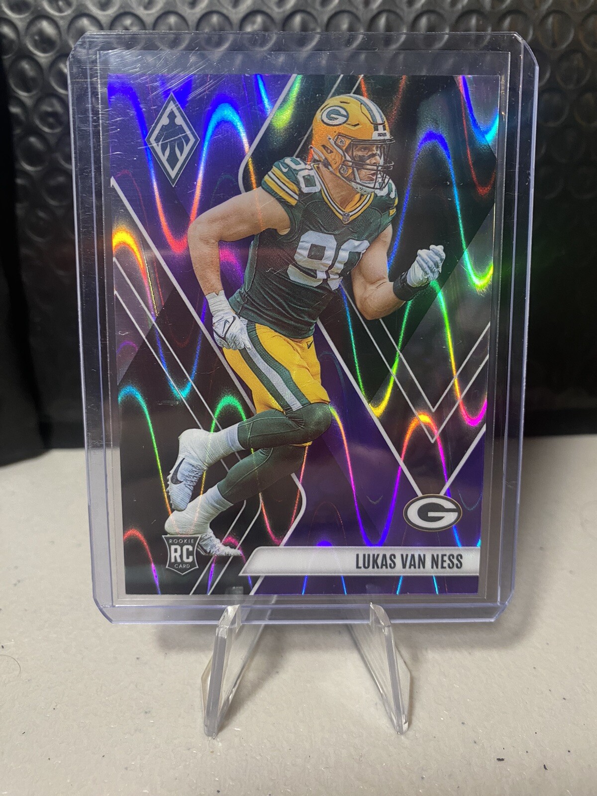 Lukas Van Ness 2023 Panini Phoenix Purple Seismic /125 #146 RC Packers