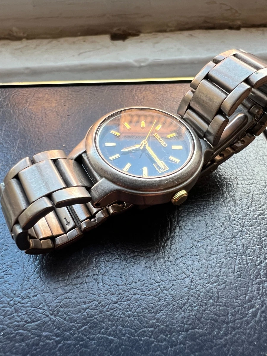 Reloj Mujer Seiko Titanium (7N82-0439) (Batería Nueva--Funciona)