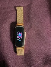 Fitbit Luxe Fitness and Wellness Tracker Rose gold with charger and extra bands