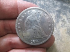 1872 US SEATED LIBERTY SILVER DOLLAR IN FINE CONDITION CLEANED