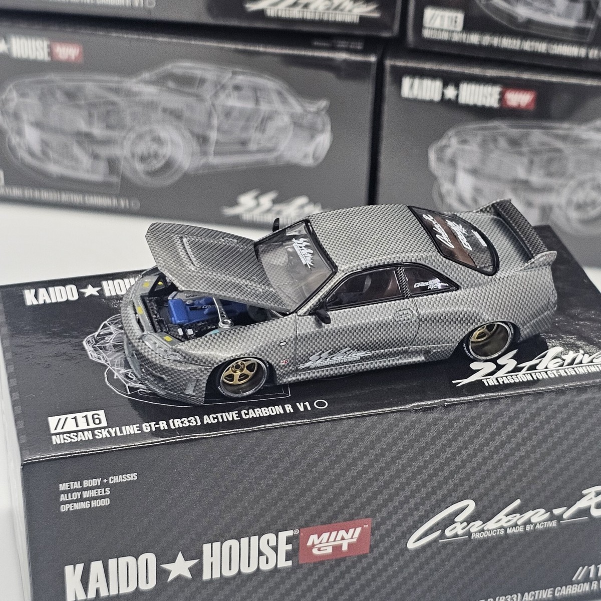 KAIDO HOUSE MINI GT NISSAN GT-R (R33) ACTIVE CARBON R