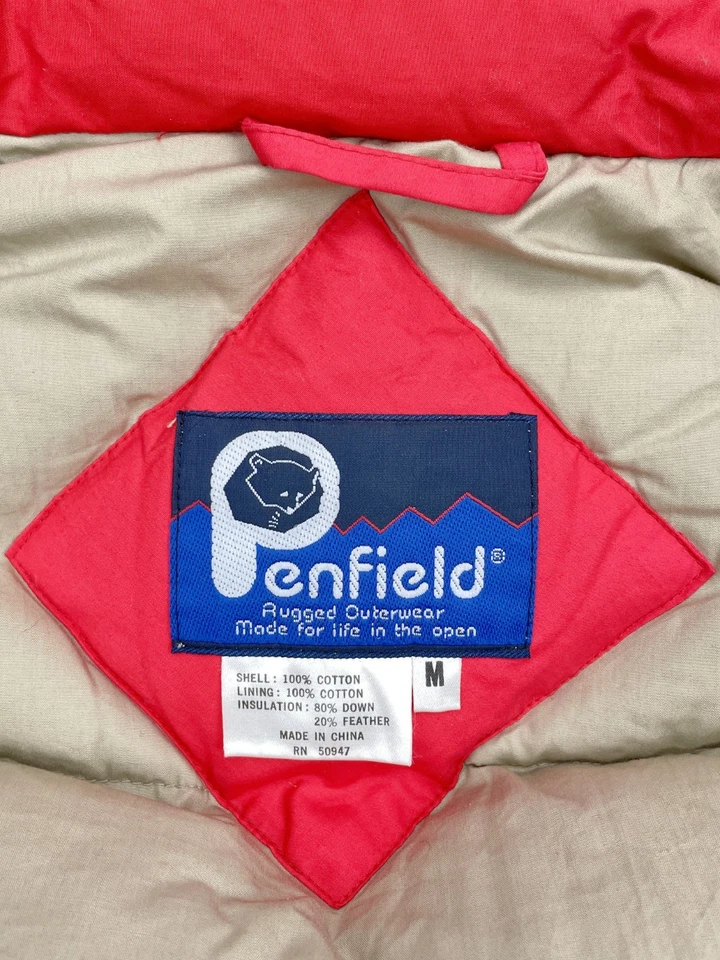 Chaleco acolchado rojo Penfield mediano aislado pluma vintage unisex Foto 2 de 4