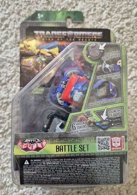 Transformers action figur Battle Cubes Optimus Prime Vs Scourge 2pck Battle Set 