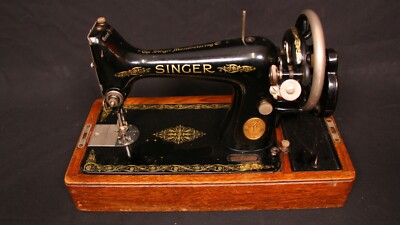 value of old singer sewing machine in wood case
