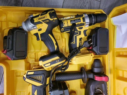 Kit 4in1 Trapano avvitatore,impulsi,smerigliatrice,tassellatore,2x4Ah,caricatore - Foto 1 di 6