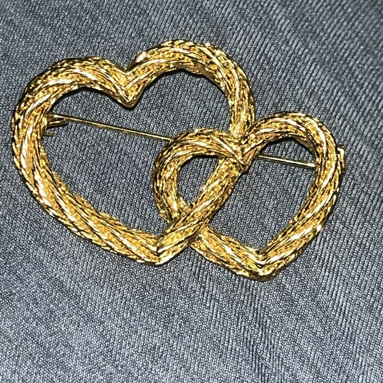 Grande broche vintage Christian Dior 1980 moderniste double coeur amour torsadé corde