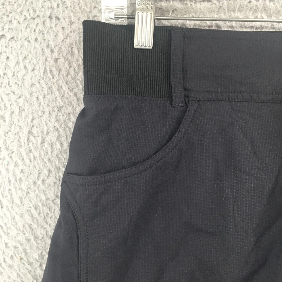 Falda Title Nine línea A para mujer 8 negros bolsillos de tiro bajo cintura elástica cremallera mosca Foto 3 de 4