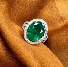 3.90 Ct Oval Cut Simulated Green Emerald Wedding Ring In 14k White Gold Plated