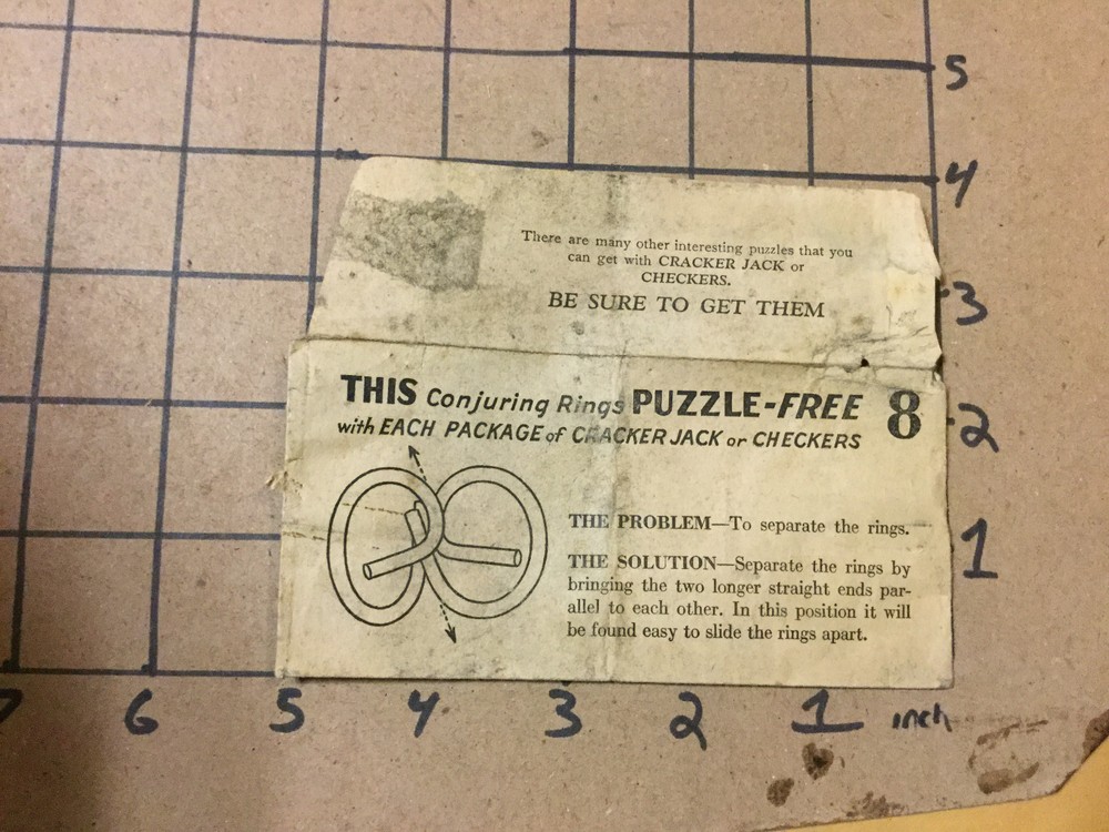 Vintage PUZZLE related paper: EARLY Package: CONJURING RINGS from CRACKER JACK