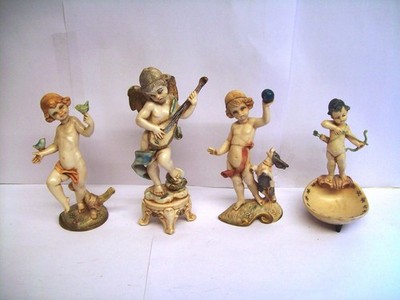 Simonetti Fontanni Depose of Italy. Vier Resin Cherub Figuren, guter Zustand.