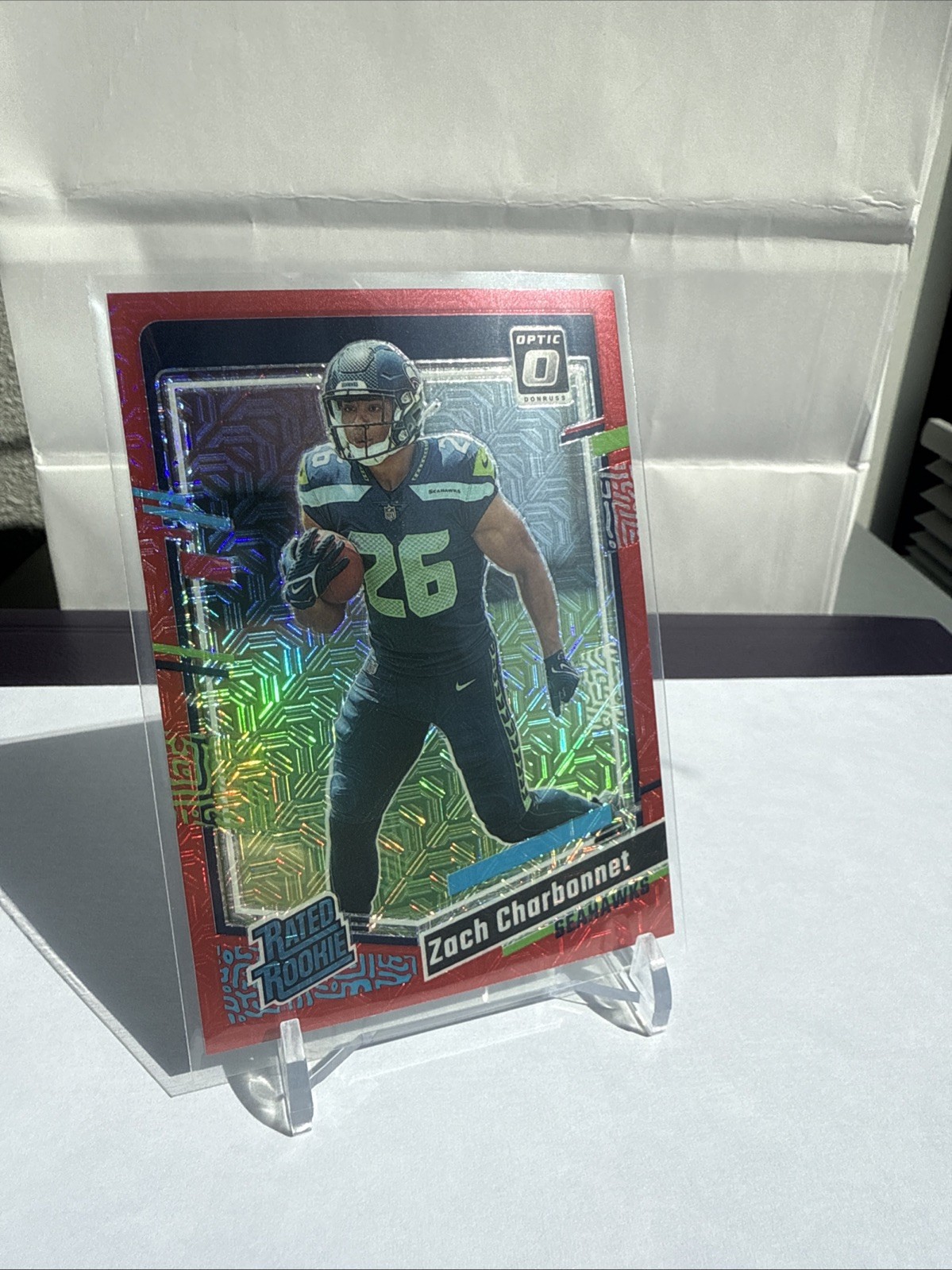 2023 Panini Donruss Optic -Rated Rookie Zach Charbonnet #294 Red Mojo Prizm (RC)