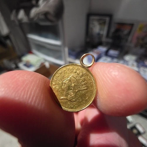 1856 $1 gold liberty.