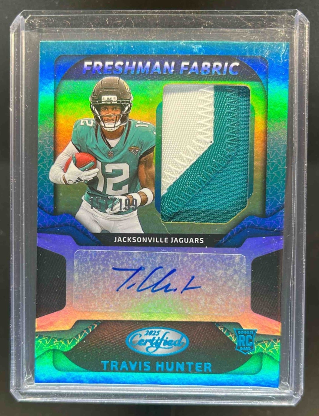 2025 Certified Travis Hunter Freshman Fabric Patch Teal RC Auto #151/199