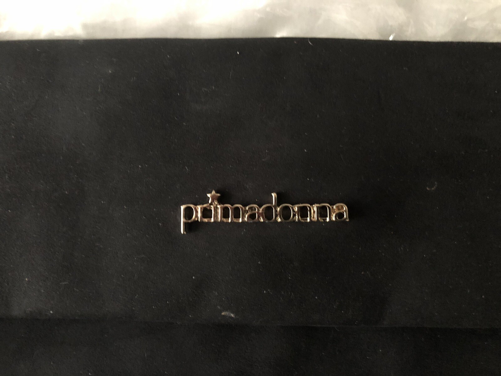 pochette primadonna nera con cinturino da polso