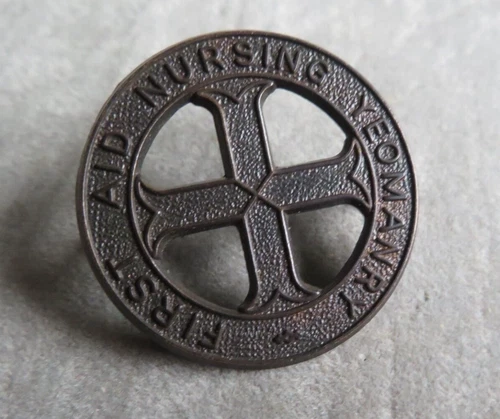 British WWI First Aid Nursing Yeomanry Hat Badge.